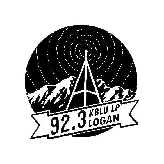 Aggie Radio logo, which includes its channel information: 92.3 KBLU LP Logan